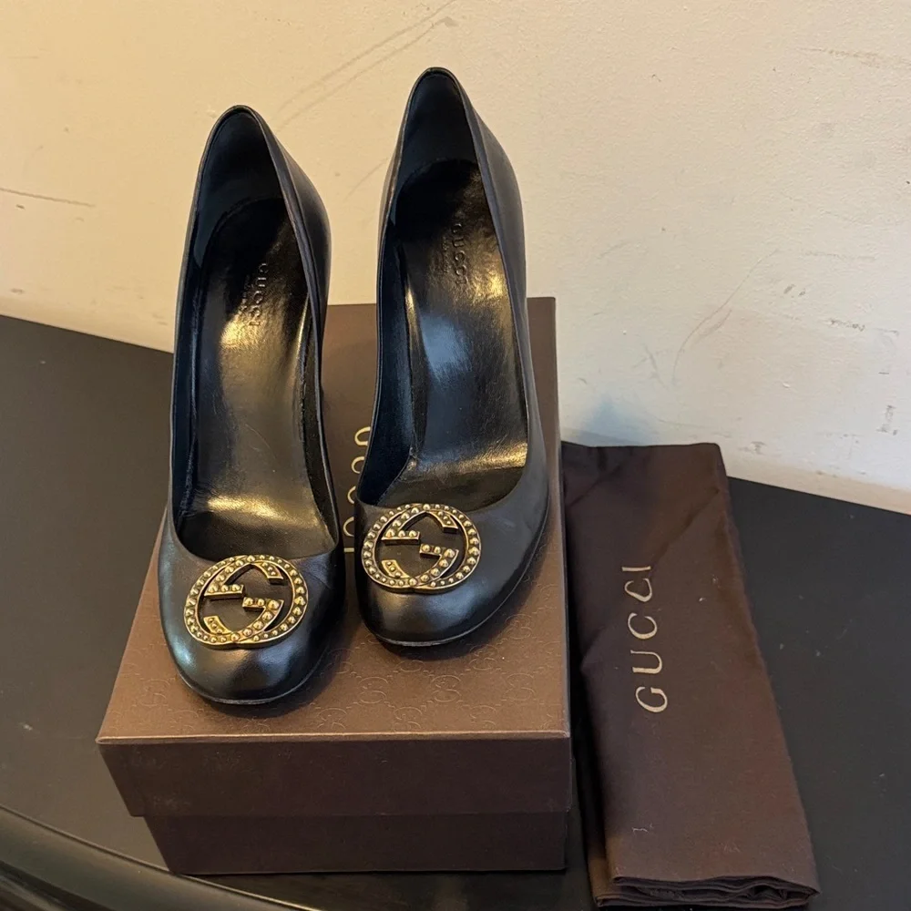 Gucci Black Heels with Iconic Gucci Gold Emblem